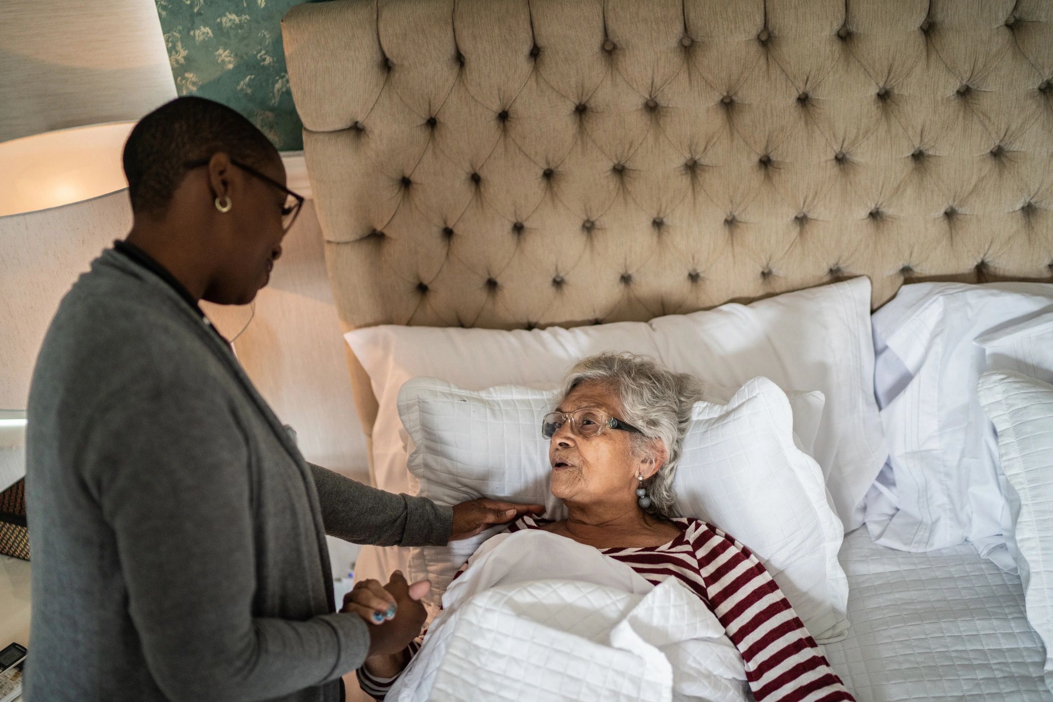 Caregiver supporting a senior at home