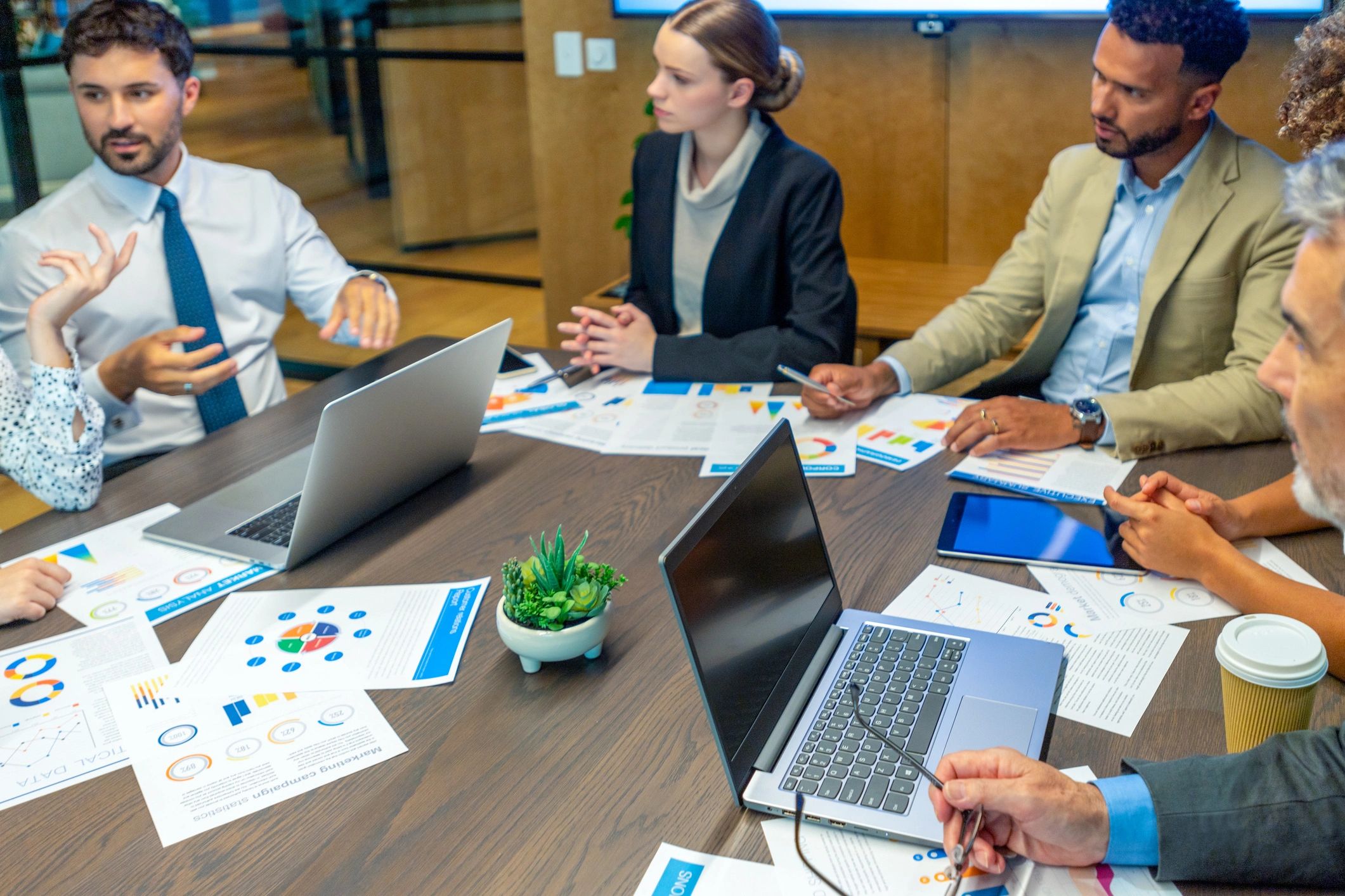 Accounting team collaborating in a modern office